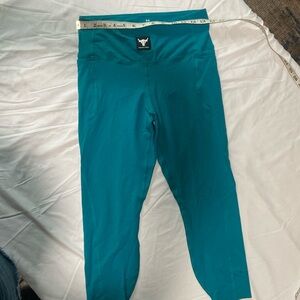 Project Rock by Under Armour Size M. Leggings with 2 pockets. EUC.